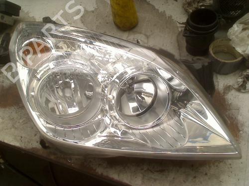Used Right headlight Right headlight OPEL ASTRA H Estate (A04) 1.6 (L35) (116 hp) 33989024 33989024