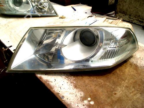 Koplamp links SKODA OCTAVIA II Combi (1Z5) 2.0 FSI (150 hp) 31128239