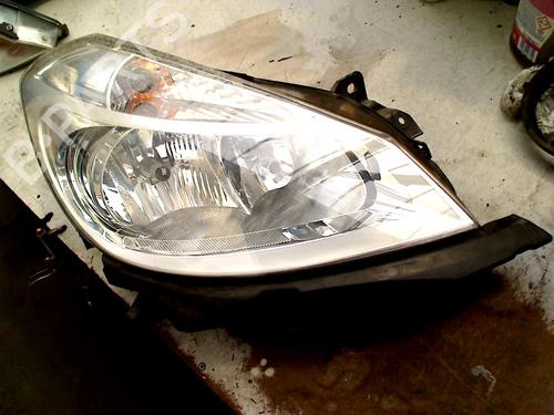Used Right headlight RENAULT CLIO III (BR0/1, CR0/1) 1.4 16V (98 hp) 31128232