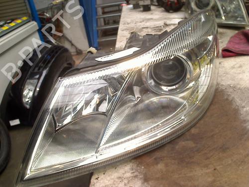 Koplamp links SKODA OCTAVIA II Combi (1Z5) 1.8 TSI (160 hp) 31128196
