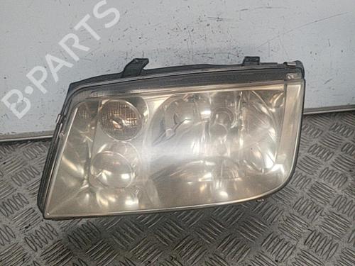 Used Left headlight VW BORA I (1J2) 1.9 TDI (130 hp) 21697352