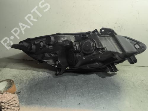 Left headlight RENAULT SCÉNIC III (JZ0/1_) 1.5 dCi | BP29732957C28