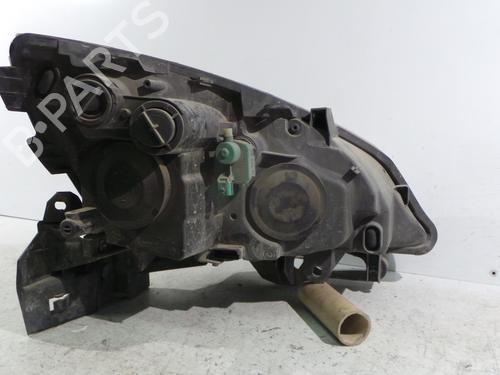 Left headlight RENAULT SCÉNIC II (JM0/1_) 2.0 dCi (JM1K) | BP30535519C28