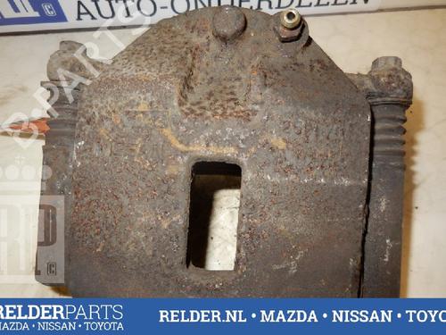 Used Left front brake caliper NISSAN PRIMERA (P12) 1.8 (115 hp) 22143301