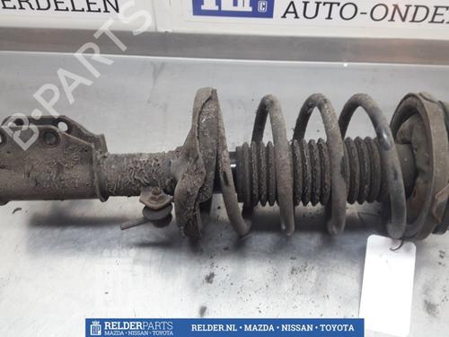 Used Left front shock absorber MAZDA 323 S VI Saloon (BJ) 1.6 (BJ10M) (98 hp) 22155330