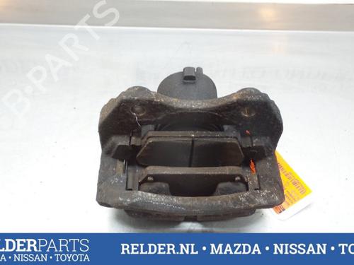 Used Left front brake caliper NISSAN PRIMERA Hatchback (P12) 1.9 dCi (116 hp) 22152475