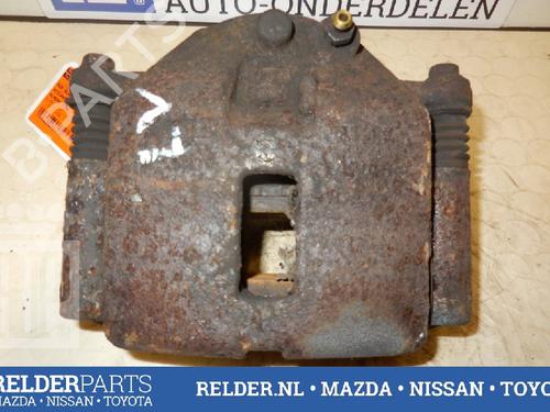 Used Left front brake caliper NISSAN ALMERA TINO (V10) 2.2 dCi (112 hp) 22147550
