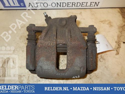 Used Right front brake caliper NISSAN MICRA III (K12) 1.2 16V (65 hp) 22145801