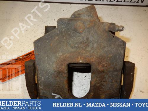 Used Left front brake caliper MAZDA 2 (DY) 1.2 (DY3W) (75 hp) 22143788