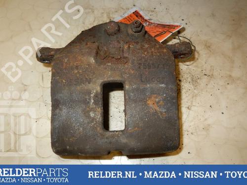 Used Left front brake caliper NISSAN ALMERA TINO (V10) 1.8 (116 hp) 22136944