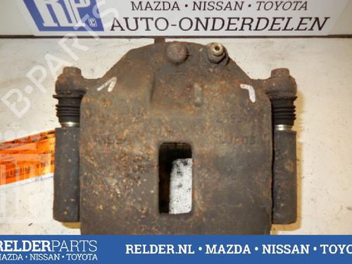Used Left front brake caliper NISSAN PRIMERA Estate (WP12) 1.8 (115 hp) 22143188