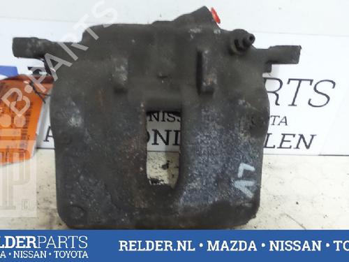 Used Left front brake caliper NISSAN PRIMASTAR Van (X83) 2.5 dCi 140 (135 hp) 22137893