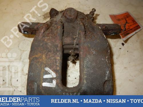Used Left front brake caliper NISSAN MICRA III (K12) 1.2 16V (65 hp) 22137257