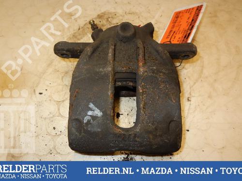 Used Right front brake caliper NISSAN MICRA III (K12) 1.2 16V (65 hp) 22139270