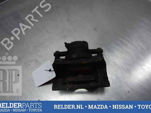 Used Left front brake caliper NISSAN MICRA III (K12) 1.2 16V (80 hp) 22151169