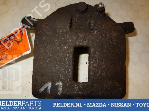 Used Left front brake caliper NISSAN ALMERA TINO (V10) 2.2 dCi (115 hp) 22137121
