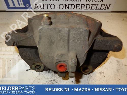 Left front brake caliper NISSAN ALMERA II Hatchback (N16) 2.2 Di | BP22135376M105 
