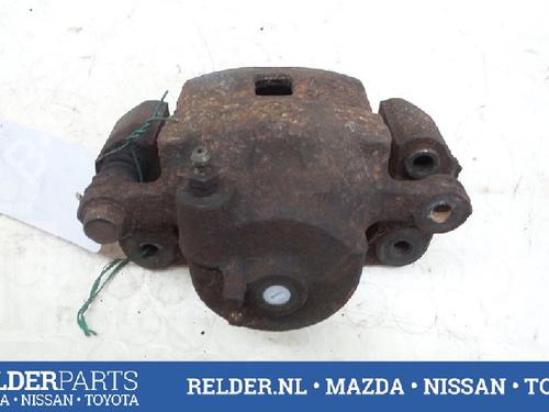 Used Left front brake caliper NISSAN ALMERA I Hatchback (N15) 1.4 (87 hp) 22134549