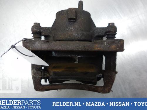 Used Left front brake caliper NISSAN ALMERA TINO (V10) 1.8 (116 hp) 22151471