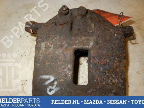 Used Right front brake caliper NISSAN PRIMERA Hatchback (P12) 1.8 (115 hp) 22137796
