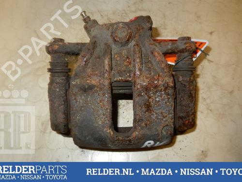 Used Right front brake caliper NISSAN MICRA III (K12) 1.2 16V (65 hp) 22142387