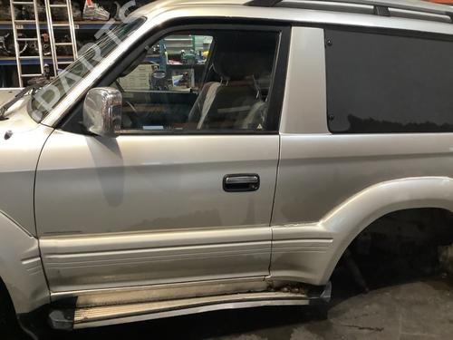 Used Left front door TOYOTA LAND CRUISER 90 (_J9_) 3.0 TD (KZJ90_, KZJ95_, KZJ90R, KZJ95R, KZJ90W, KZJ95W) (125 hp) 23187065