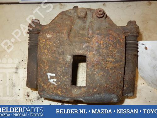 Used Left front brake caliper NISSAN PRIMERA Hatchback (P12) 2.2 dCi (139 hp) 22141995