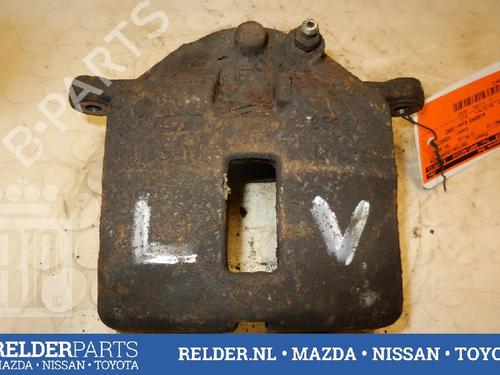 Used Left front brake caliper NISSAN ALMERA TINO (V10) 2.0 (136 hp) 22136820