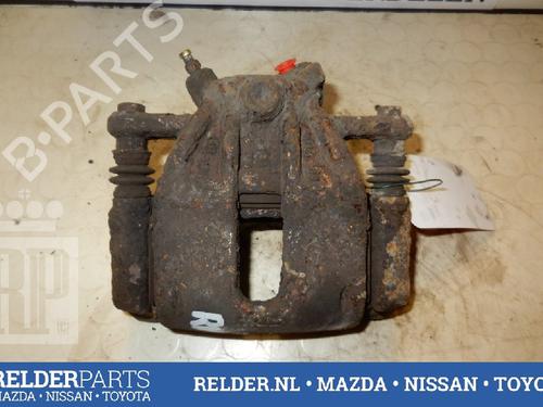 Used Right front brake caliper NISSAN MICRA III (K12) 1.2 16V (65 hp) 22146582