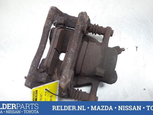 Used Left front brake caliper NISSAN MICRA III (K12) 1.2 16V (65 hp) 22153188