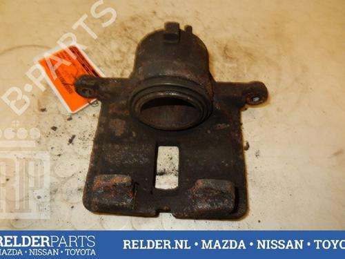 Used Left front brake caliper NISSAN PRIMERA (P12) 1.6 (106 hp) 22138236