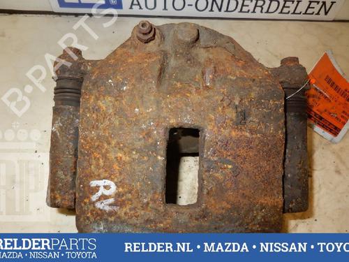 Used Right front brake caliper NISSAN PRIMERA Hatchback (P12) 2.2 dCi (139 hp) 22141997