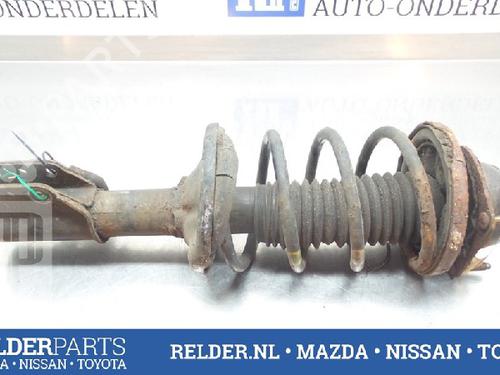 Used Left front shock absorber MAZDA 323 P V (BA) 1.5 16V (88 hp) 22135977