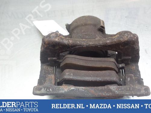 Used Left front brake caliper NISSAN MICRA III (K12) 1.0 16V (65 hp) 22152304