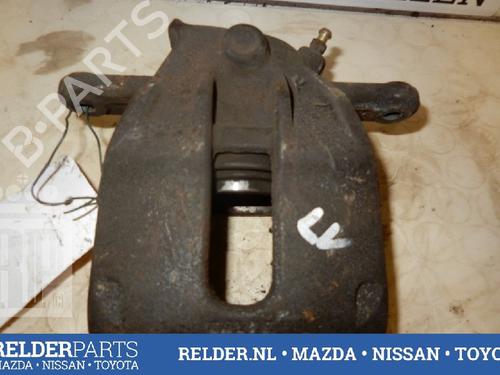 Used Left front brake caliper NISSAN MICRA III (K12) 1.2 16V (80 hp) 22140527