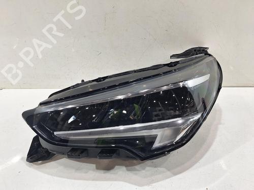 Used Left headlight VAUXHALL CORSA Mk V (F) 1.2 (101 hp) 31208383