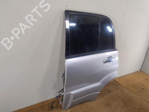 Left rear door SUZUKI GRAND VITARA I (FT, HT) 2.0 HDI 110 16V 4x4 (SQ420D, TD83V, JA420WD) | BP30117132C4 