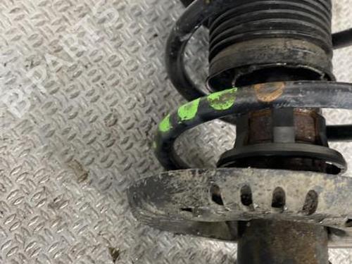 Used Left front shock absorber SEAT IBIZA IV (6J5, 6P1) 1.4 TDI (80 hp) 24101388