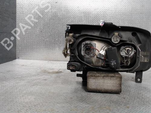 Used Left headlight VW POLO (6N2) 1.4 TDI (75 hp) 24098396