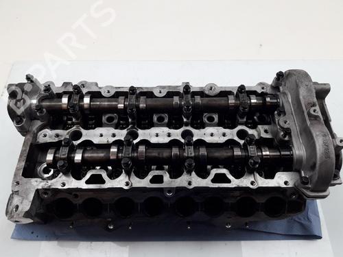 Used Cylinder head VOLVO V40 Hatchback (525) D2 (120 hp) 23897048