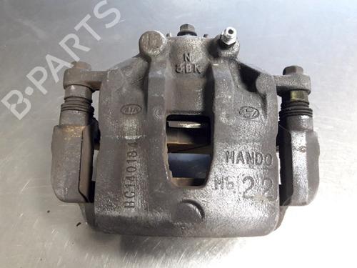 Used Left front brake caliper KIA RIO III (UB) 1.25 CVVT (86 hp) 22472096