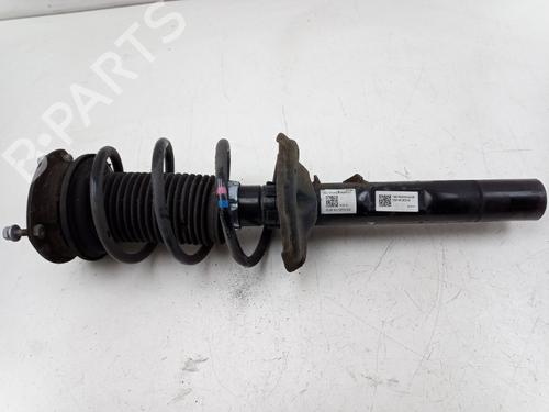 Venstre fortil støddæmper SKODA OCTAVIA III Combi (5E5, 5E6) 1.5 TSI (150 hp) 23395357