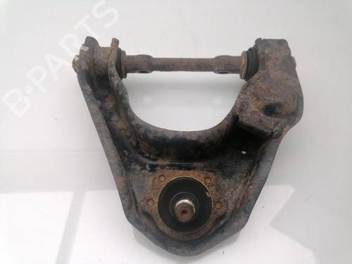 Used Left front suspension arm NISSAN TERRANO II (R20) 2.7 TD 4WD (101 hp) 23941656