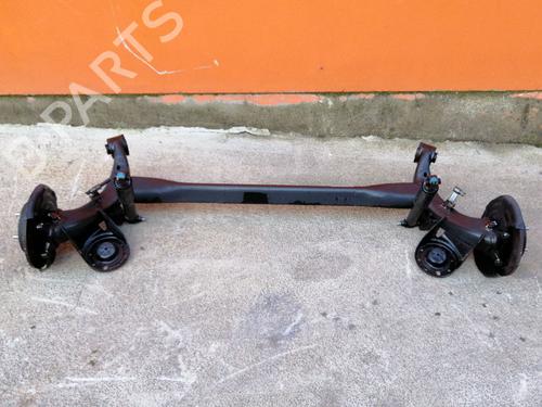Used Rear axle KIA RIO III (UB) 1.25 CVVT (86 hp) 24402039