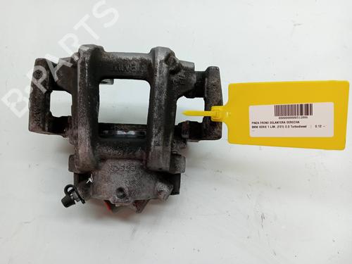 Used Right front brake caliper BMW 1 (F21) 118 d (143 hp) 23341376