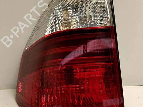 Used Left taillight BMW X3 (E83) 2.0 sd (177 hp) 31062200