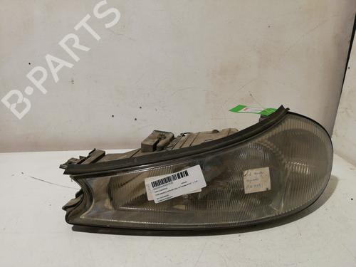 Used Left headlight FORD MONDEO II (BAP) 1.8 TD (90 hp) 25987880
