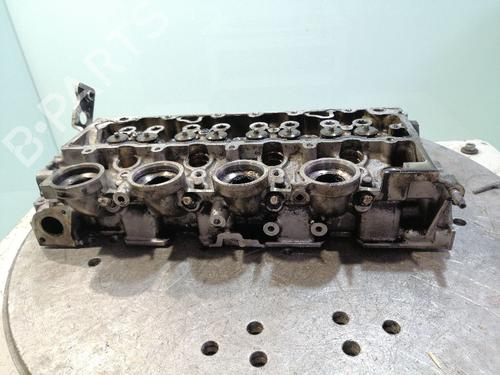 Used Cylinder head FORD FIESTA V (JH_, JD_) 1.4 TDCi (68 hp) 23453909