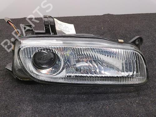 Used Right headlight Right headlight MAZDA 323 P V (BA) 1.5 16V (88 hp) 22852331 22852331