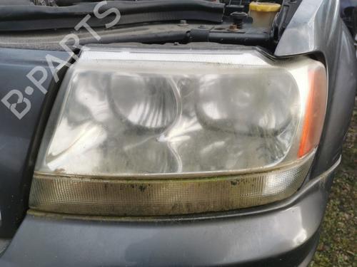Used Left headlight JEEP GRAND CHEROKEE II (WJ, WG) 2.7 CRD 4x4 (163 hp) 22869362